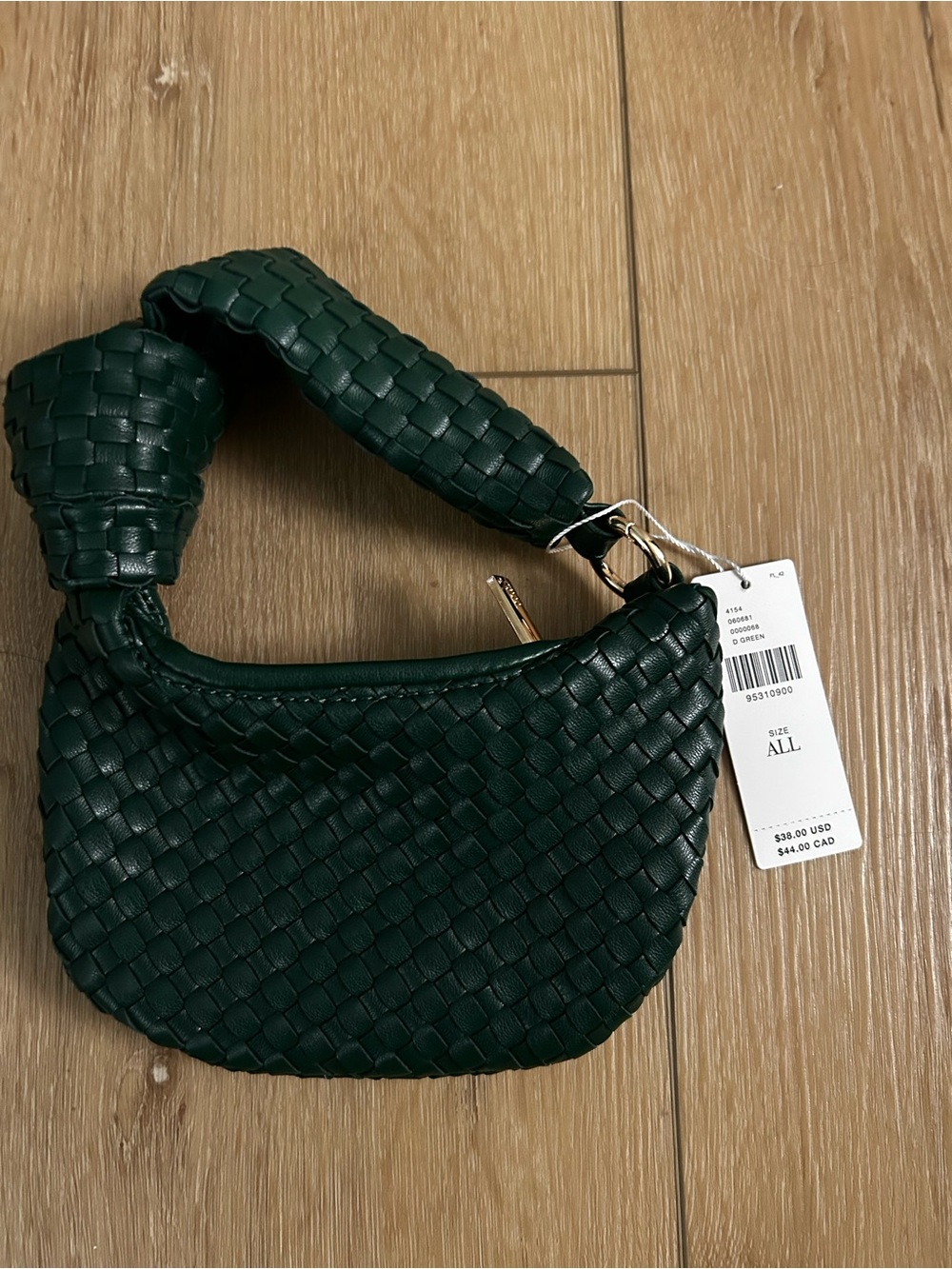 The Mini Brigitte Woven Charm Bag by Melie Banco